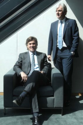 'There is no denying it's tough': Westfield co-chief executives Peter Lowy (seated) and his brother Steven.