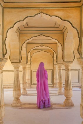 A saried princess stalks the audience hall at Amber Fort, Jaipur.