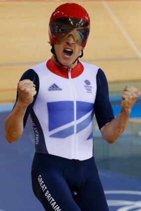 Great Britain's Geraint Thomas celebrates the gold.