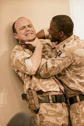Iago (Rory Kinnear) and Othello (Adrian Lester) come to blows.