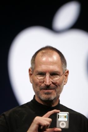 Shaped a generation ... Steve Jobs showcases the iPod nano.