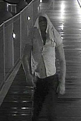 Security footage of the man believed to have jumped or fallen from a vessel moored at Eagle Street Pier.