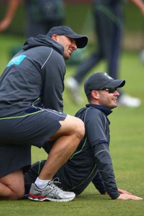 Michael Clarke has his back attended to by physio Alex Kountouris at Trent Bridge on Monday.