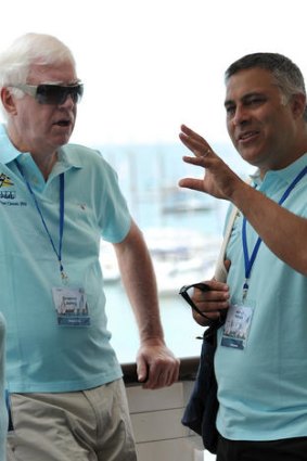 Ahmed Fahour (right) with former Australia Post CEO Graeme John.