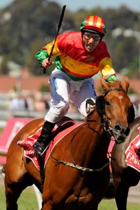 Victorious ... Damien Oliver won the Emirates Stakes on Happy Trails.