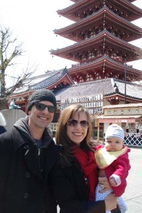 Barry Divola, his wife, and baby Coco at Senso-ji temple.
