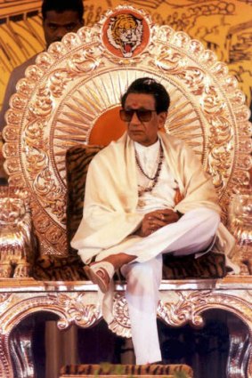 Hindu nationalist party Shiv Sena chief Bal Thackeray sits on a silver throne presented to him at a party convention in 2002.