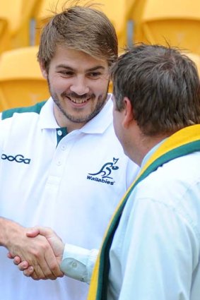 On board ... Drew Mitchell with Queensland Sports Minister Phil Reeves during a 2013 British and Irish Lions Tour Press Conference at Suncorp Stadium.
