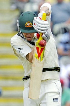 On the defensive: Michael Clarke in England.