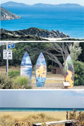 Creative wave ... (from top): Waratah Bay, surfboards painted by local schoolchildren; Sandy Point’s quiet beachfront.