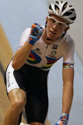 Cameron Meyer celebrates after winning the points race at last month's UCI track cycling world cup event in Melbourne.
