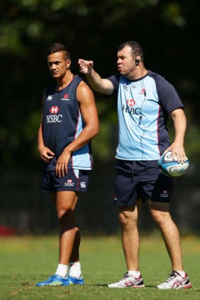 Point taken: Michael Cheika speaks and Peter Betham listens.