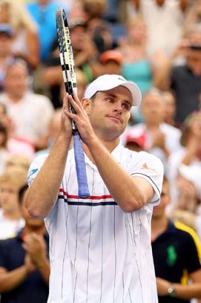 Game over &#8230; Andy Roddick thanks his home crowd; left, Roger Federer during his loss to hard-hitting Tomas Berdych.