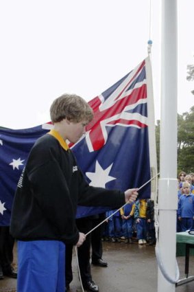 There are calls for schools to raise the Australian flag and sing the national anthem.