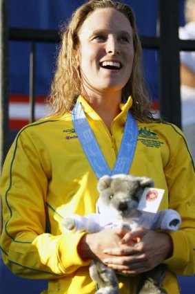 Marieke Guehrer of Australia on the podium after winning thbe 50m butterfly.