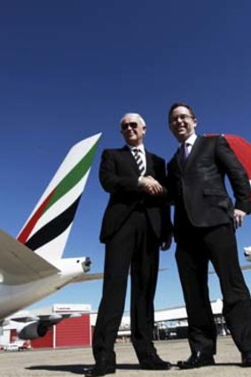 Emirates' Tim Clark and Qantas' Alan Joyce shake on their deal.