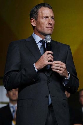 Lance Armstrong addresses the Livestrong faithful.