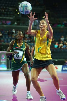 Kimberley Ravallion of Australia gathers the ball in the match against South Africa.