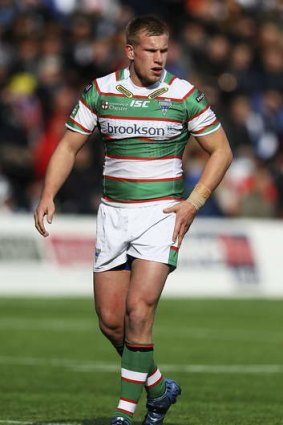 Wolf at the door: Warrington forward Mike Cooper will become the NRL's latest English import when he joins the Dragons for 2014.