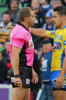 Too much information: Jarryd Hayne speaks to referee Ben Cummins on Sunday. Should fans be able to hear what they are saying?