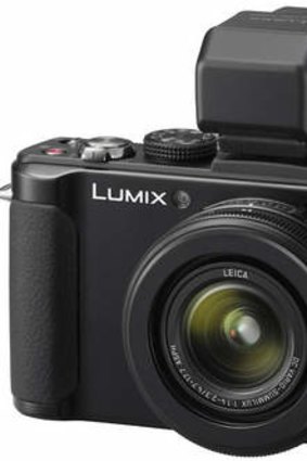 That's extra: A Panasonic LX7 with its optional viewfinder.