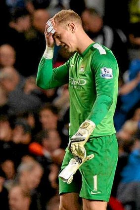 Dejected: Hart after his error cost Manchester City a point against Chelsea.
