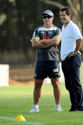 Canberra coach David Furner talks with Robbie Deans at Raiders training on Thursday.
