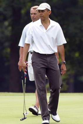 In this photo taken June 18, 2011, President Barack Obama and House Speaker John Boehner play a few holes. Today, Boehner describes their relationship as 'frosty'.