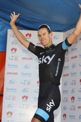 Richie Porte waves to the crowd.