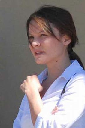 Kristie Perry leaves the Mackay Courthouse on Friday after being placed on probation for 18 months.