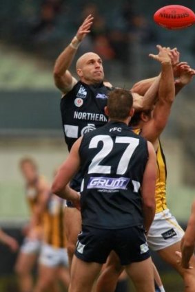 Chris Judd flies for a mark in his comeback for the Northern Blues.