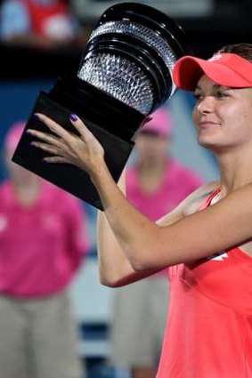 The spoils: Agnieszka Radwanska shows off her Sydney International trophy.