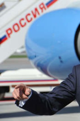 Persuasion: US Secretary of State John Kerry arrives at Moscow Vnukovo Airport on Tuesday.