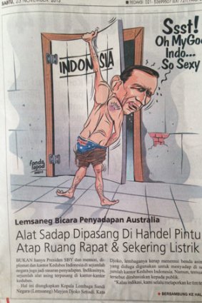 A caricature on the front page of an Indonesian newspaper depicts Abbott as a peeping tom, prising the door of Indonesia open with his hand down the front of his pants. He's moaning: "Ssst! Oh My God Indo ... So Sexy".