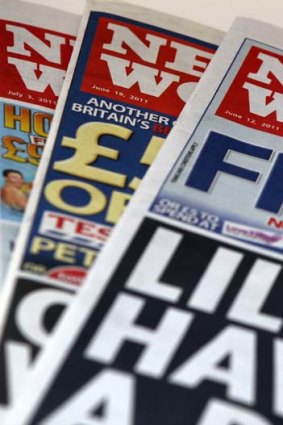 Copies of Britain's News of the World newspaper.