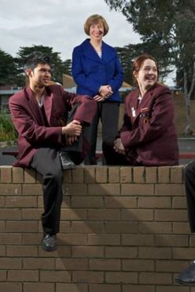 Carwartha College principal Bronwyn Hamilton with students Raymond Comeros (left), Emily Smith and Thierry Florent.
