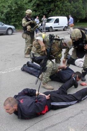 Ukrainian soldiers search suspected citizens of Slovyansk, eastern Ukraine.