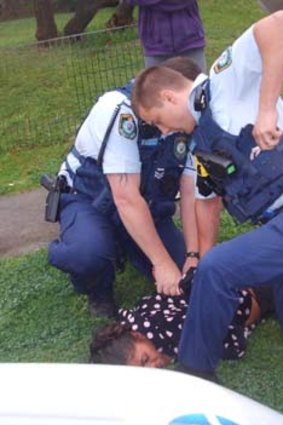 Pinned to the ground ... Letisha Hickey was arrested at her party.