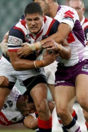 Rampaging Rooster...Willie Mason in action in 2008 against Melbourne, his new employers.