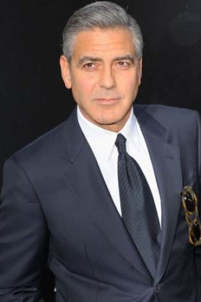 Trading insults: George Clooney.