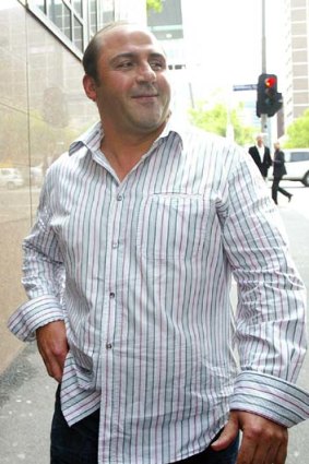Tony Mokbel leaves court in 2005.