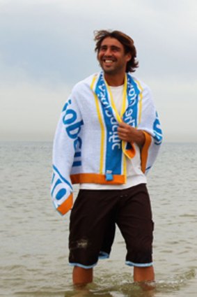 Marcos Baghdatis relaxes at Brighton beach yesterday.