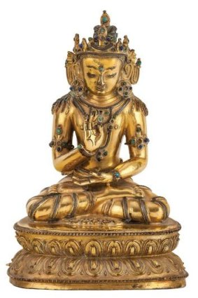 Treasured: A bronze/gold statue of a Tibetan god.