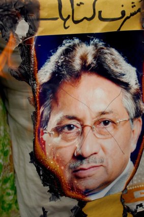 Demonstrators burn a poster of President Pervez Musharraf, who is likely to face impeachment proceedings in parliament next week.