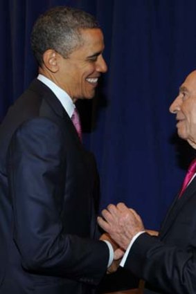 "For the sake of Israel's security" ... Barack Obama and Israel's President Shimon Peres discuss Iran.