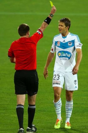 Adrian Leijer is yellow-carded.