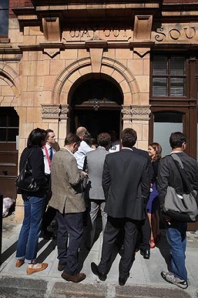 Reporters gather outside the home of arrested UBS employee Kweku Adoboli.