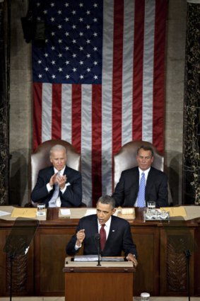 President Barack Obama delivers the State of the Union address. Behind him are Vice President Joseph Biden (left) and Rebublican House Speaker John Boehner.