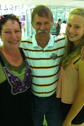 Sydneysiders Roxanne Russell, Grahame Russell are picked up by the granddaughter Erin Bryers at Brisbane Airport.