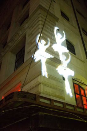 Images were projected on walls across the city.